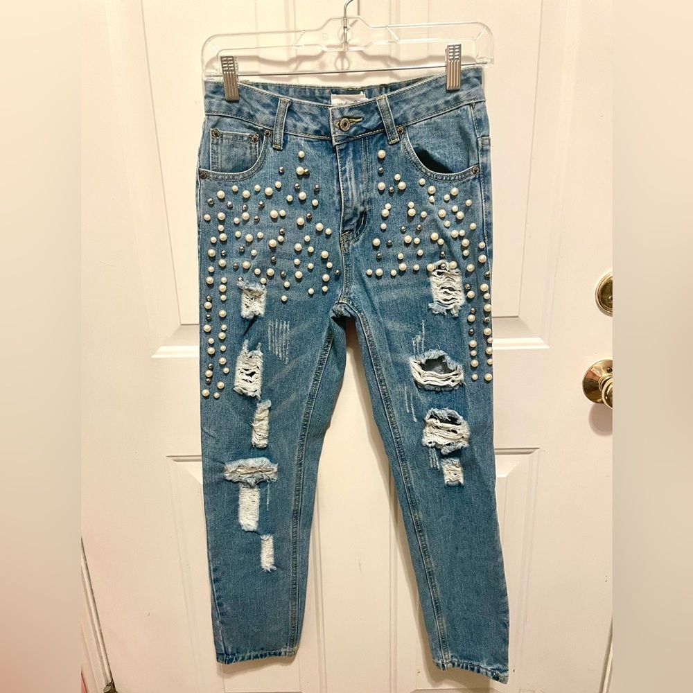 Pearl and rhinestone distressed jeans